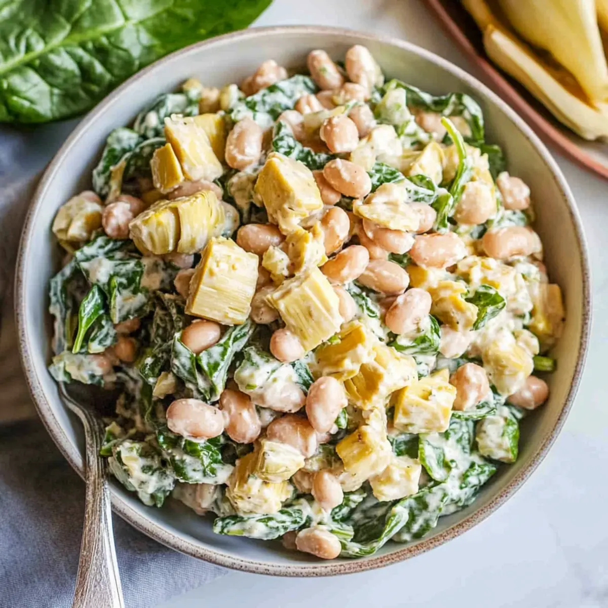 Spinach Artichoke Dense Bean Salad